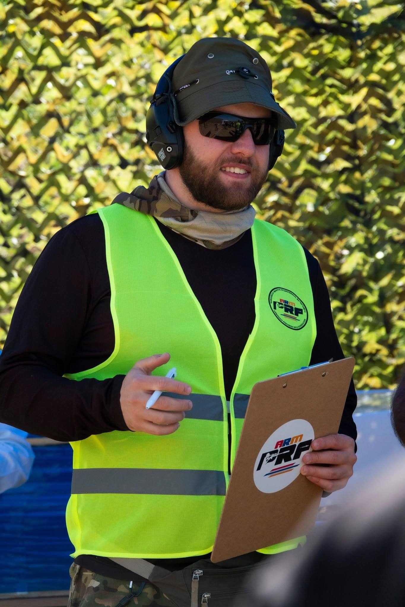 A range officer with the score sheet during a stage