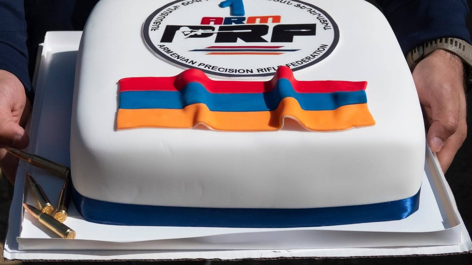 The federation's anniversary cake, carrying the ARMPRF crest and the Armenian flag